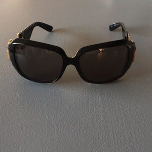 Gucci black glasses with bamboo signature on side